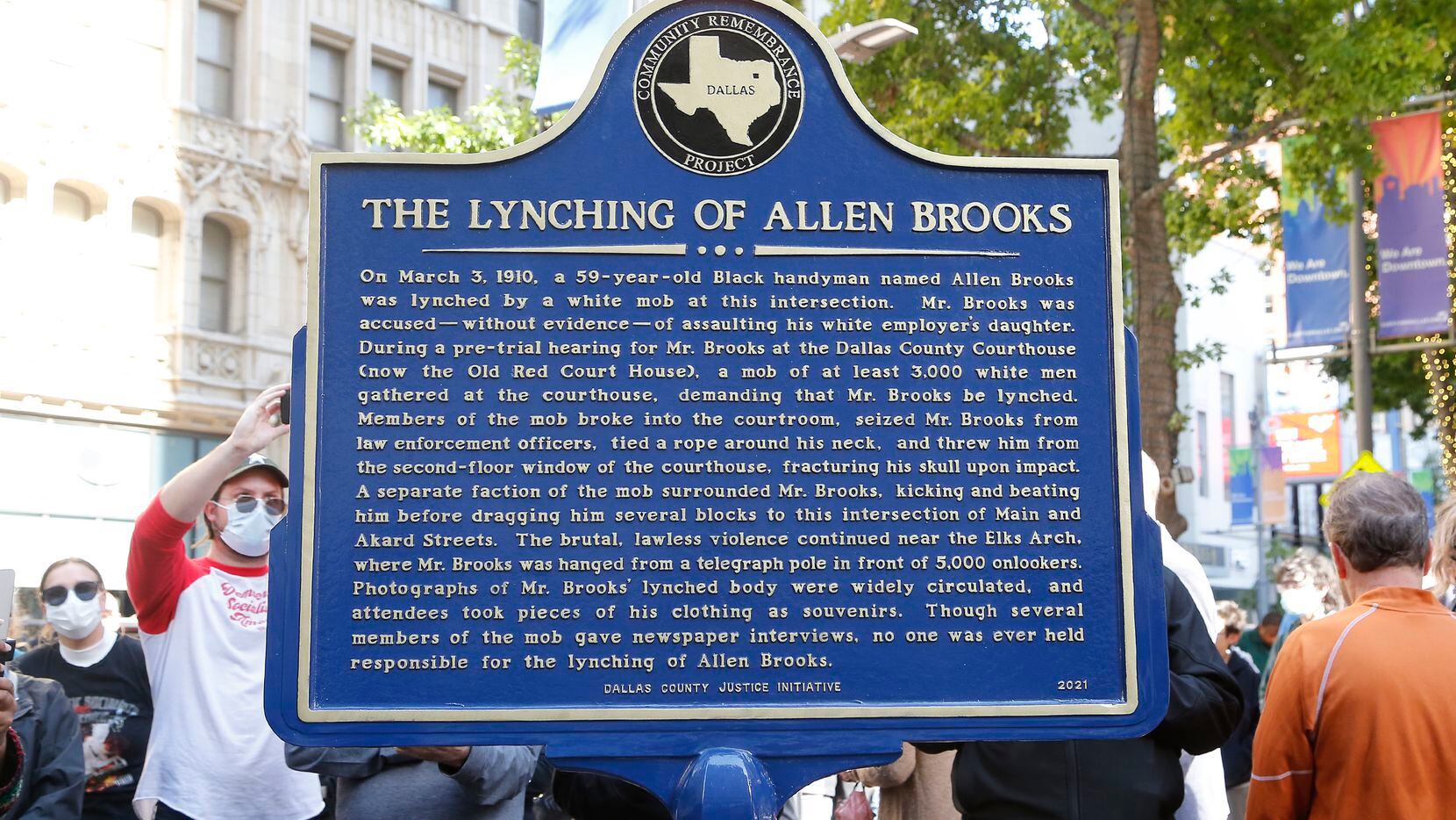 The marker commemorating the lynching of Allen Brooks was dedicated at Pegasus Plaza in...