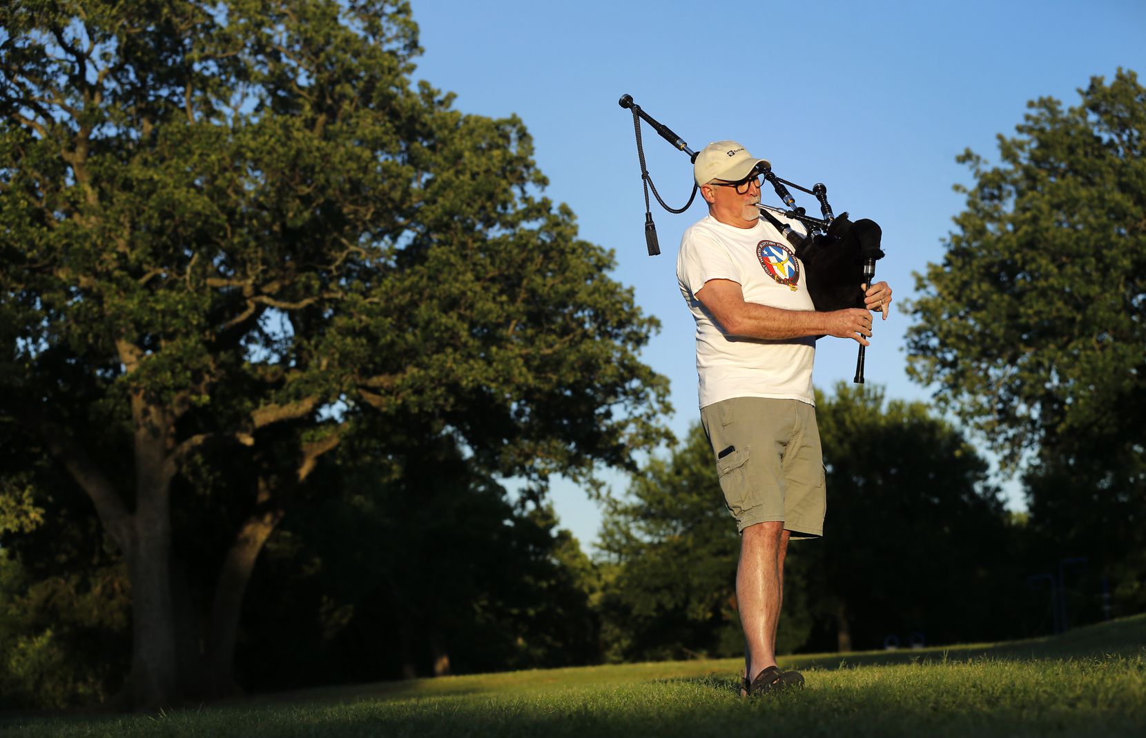 Bagpiper Tony Hill, 63, a safety analyst for a Dallas hospital, practiced Wednesday at Gibbins Park in Arlington. “I’ve had several people in the neighborhood tell me it was so nice to hear that music drifting across the neighborhood,” Hill said. 