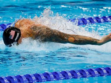 USA’s Caeleb Dressel competes in the men’s 4x100 meter medley relay final during the...