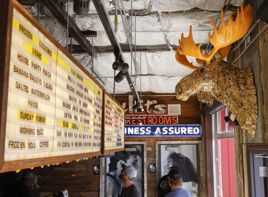 The beer-can-covered moose is new to Truck Yard in Dallas. The backyard bar reopened March...