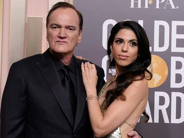 Quentin Tarantino, left, and Daniella Pick arrive at the 80th annual Golden Globe Awards at...
