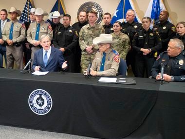 Supported by agents from the Department of Public Safety, Tarrant County Sheriff's Deputies and members of the Texas National Guard, Texas Governor Greg Abbott addresses the media at a press conference on May 27, 2021 at the Tarrant County Sheriff's Office in Fort Worth, Texas, to take stock of efforts to secure the border and prevent the smuggling of dangerous drugs into Texas.  (Robert W. Hart / Special Contributor)