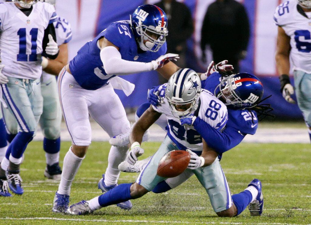 Dallas Cowboys wide receiver Dez Bryant (88) fumbles the ball during the second half of an...