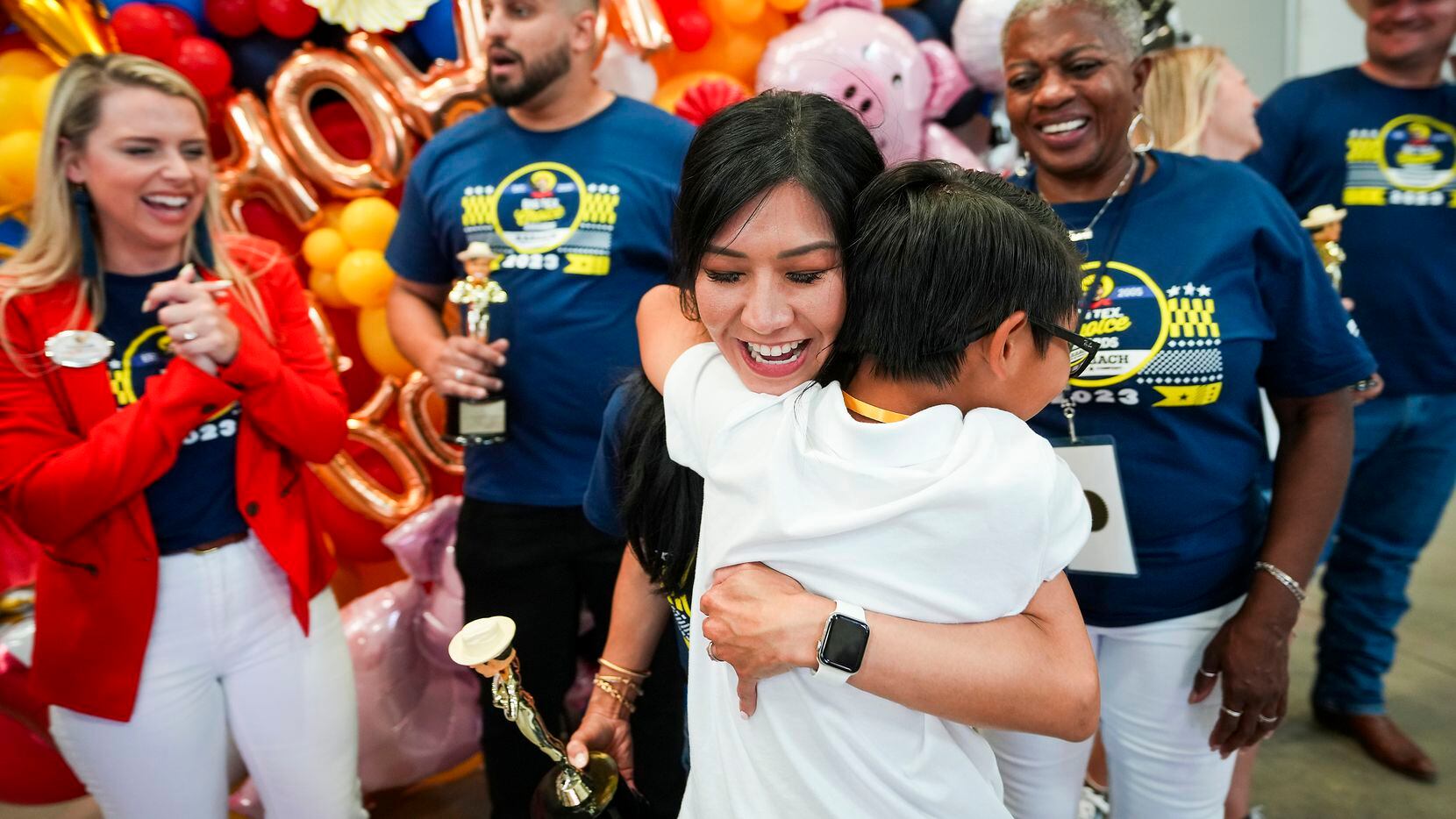 Michelle Le celebrates with her son Ethan, 11, after winning 'Best Taste - Savory' for her...