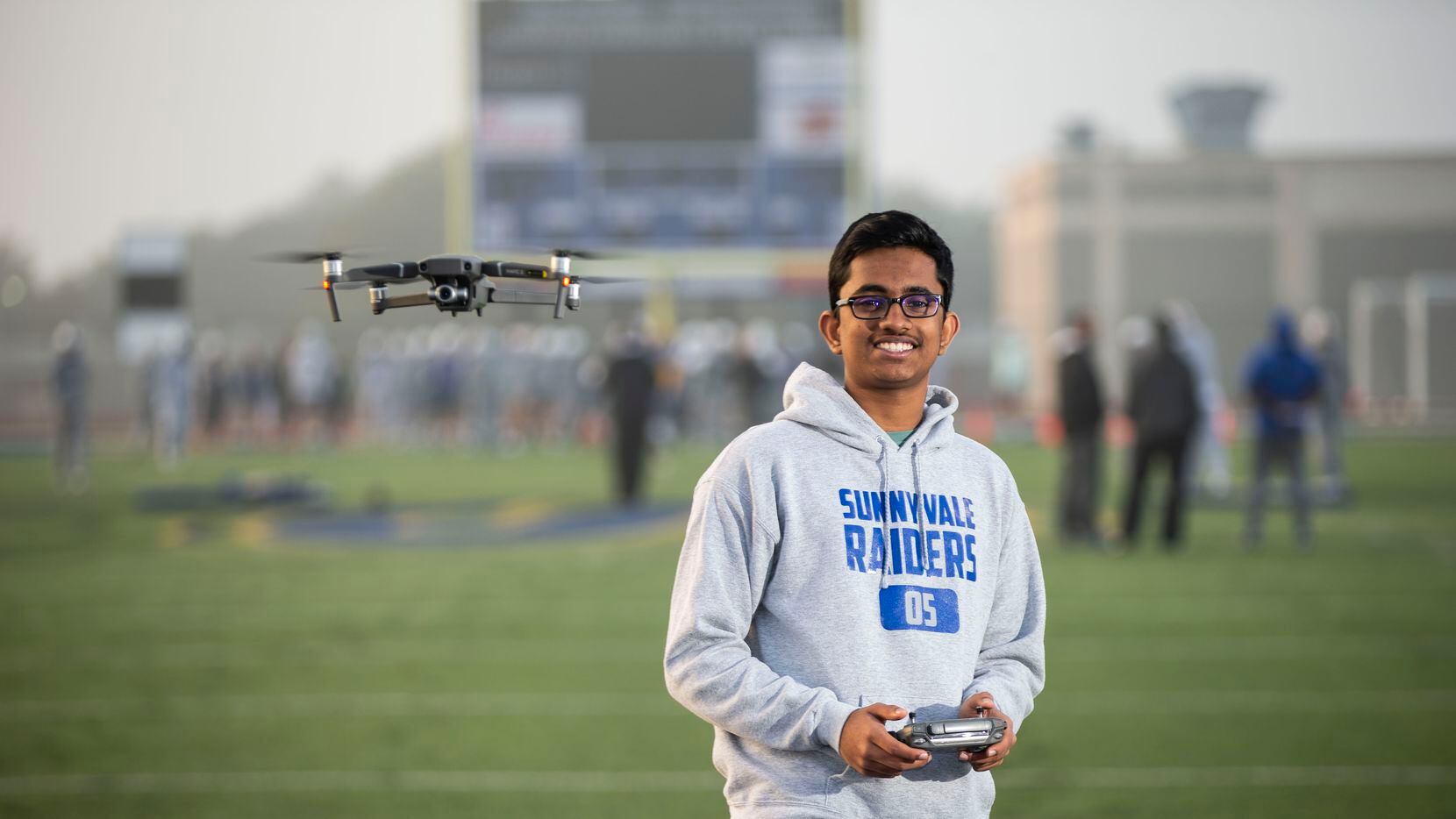 Sunnyvale High School sophomore Ryan Mathew, the football team manager, poses for a photo...