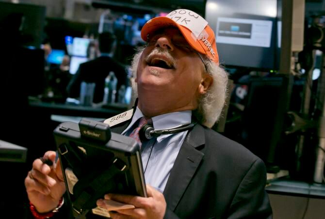 
A trader at the New York Stock Exchange was goofing around July 1 with his “Dow 17,000”...