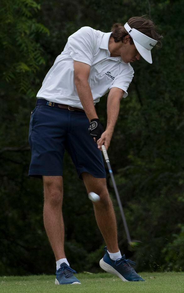Highland Park gold, Mack Duvall, tees off on the no. 2 hole during the final round of UIL...