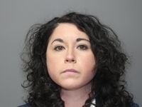 Elissa Wev, a candidate for one of Dallas County's family violence courts, turned herself into jail on Jan. 27, 2022, for a misdemeanor family violence warrant.