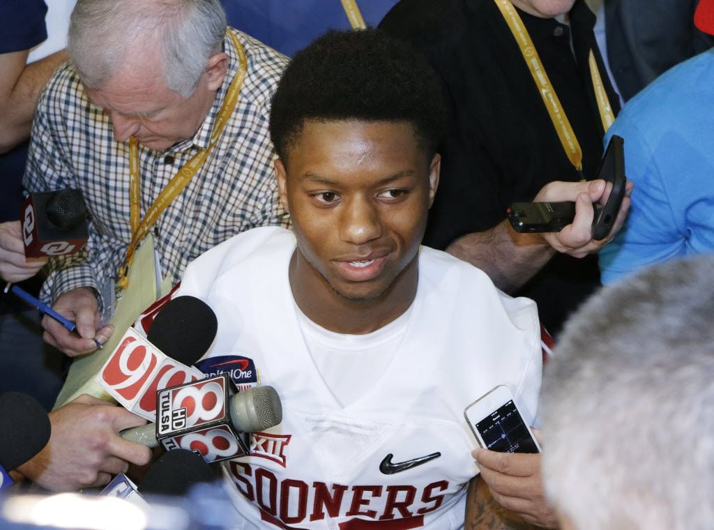 Oklahoma running back Joe Mixon speaks with reporters during the media day for the Orange...