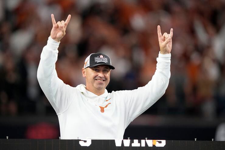 FILE - Texas head coach Steve Sarkisian celebrates after his team won the Big 12 Conference...