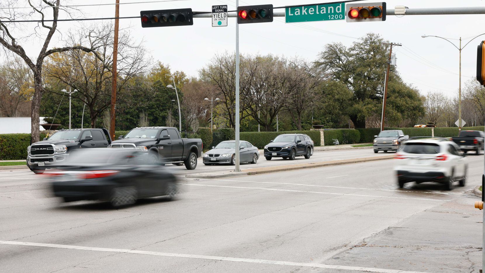 Red lights don't deter motorists Wednesday on Garland Road at the intersection adjacent to...