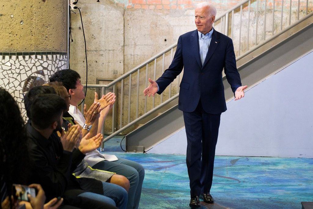 Democratic presidential candidate Joe Biden is introduced before speaking to participants in...
