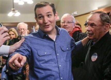  Sen. Ted Cruz visits with supporter Court Oviatt of Logan, Iowa, after a campaign speech at...