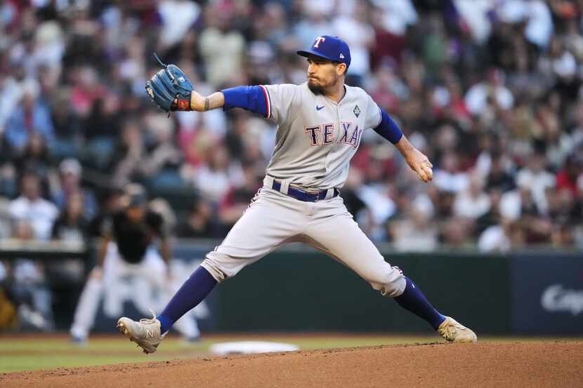 Texas Rangers starting pitcher Andrew Heaney (44) throws during the first inning in Game 4...