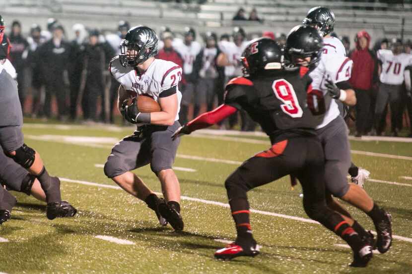Argyle Eagle's running back, Nick Ralston (22), runs the ball down the field during the...