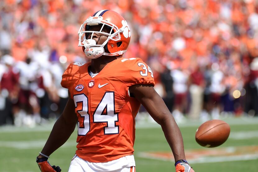 Clemson wide receiver Ray-Ray McCloud (34) drops the football as he enters the end zone...