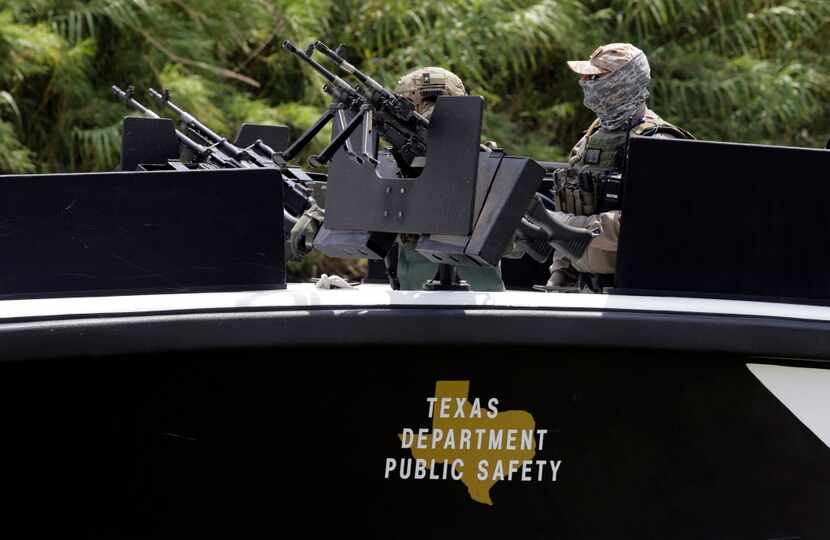 Texas Department of Safety troopers patrol on the Rio Grande along the U.S.-Mexico border in...