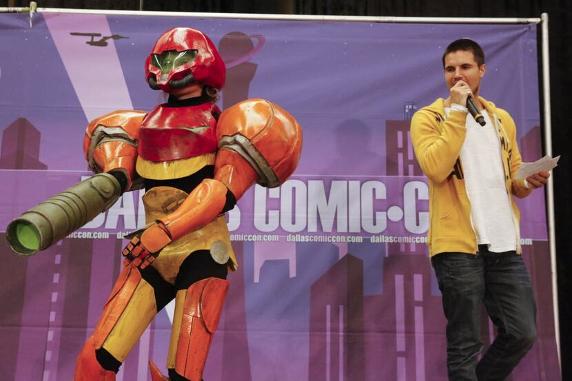 Katy Anderson as Samus Aran is introduce by TV star Robbie Amell at the Dallas Comic Con Fan...