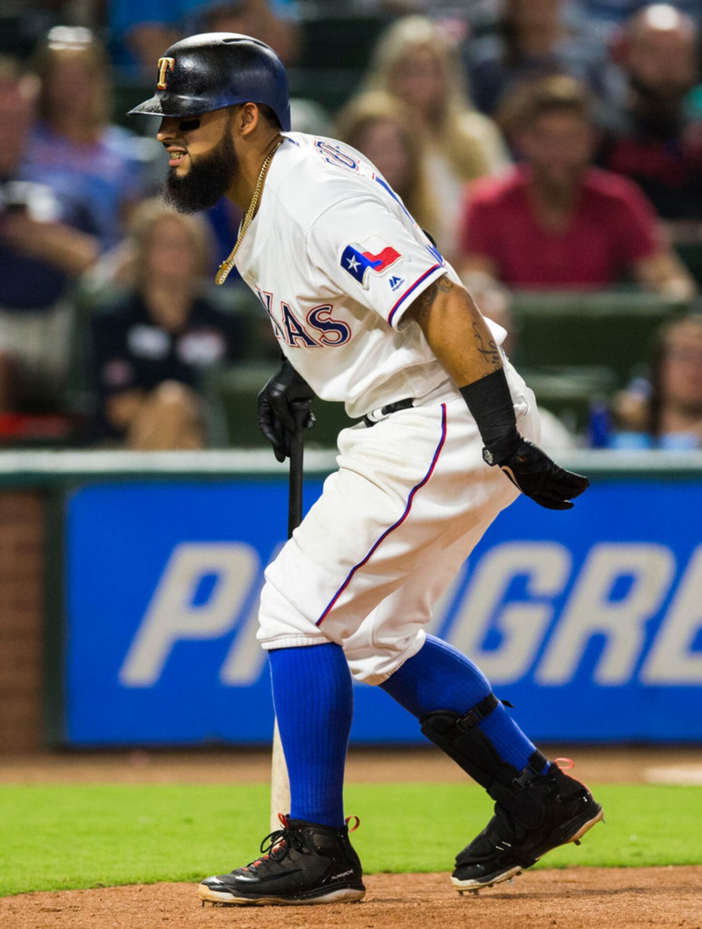 Texas Rangers second baseman Rougned Odor (12) reacts after fouling a ball off his right...