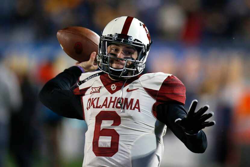 MORGANTOWN, WV - NOVEMBER 19:  Baker Mayfield #6 of the Oklahoma Sooners warms up before the...