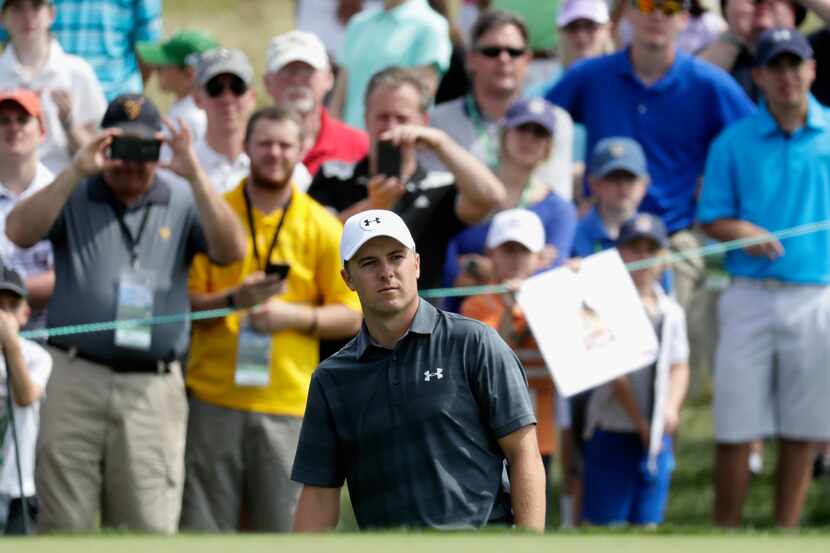 Jordan Spieth of the United States plays his shot during a practice round prior to the U.S....