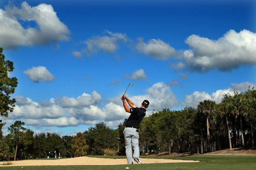 NAPLES, FL - DECEMBER 12:  Hunter Mahan hits his approach shot on the  sixth hole during the...