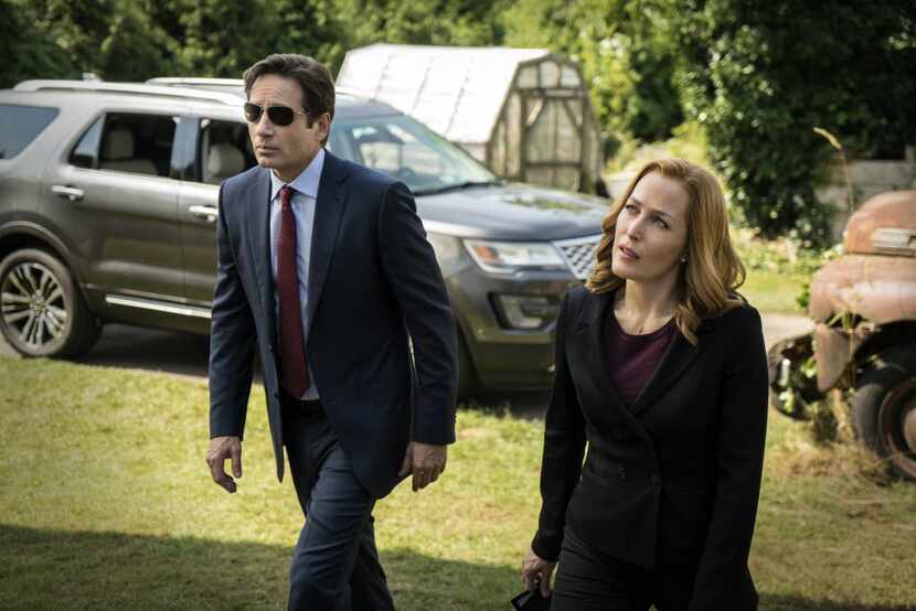 David Duchovny, left, as Fox Mulder and Gillian Anderson as Dana Scully in The X-Files.