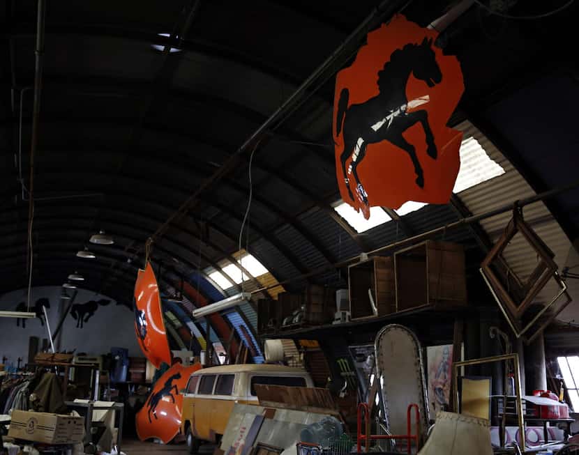 Large shields from the now defunct Bronco Bowl on display in an Oak Cliff warehouse...