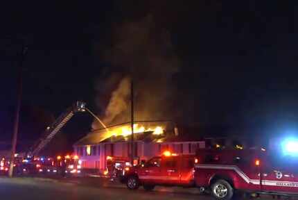 Dallas Fire-Rescue crews battle a fire that broke out Thursday morning at a northwest Dallas...