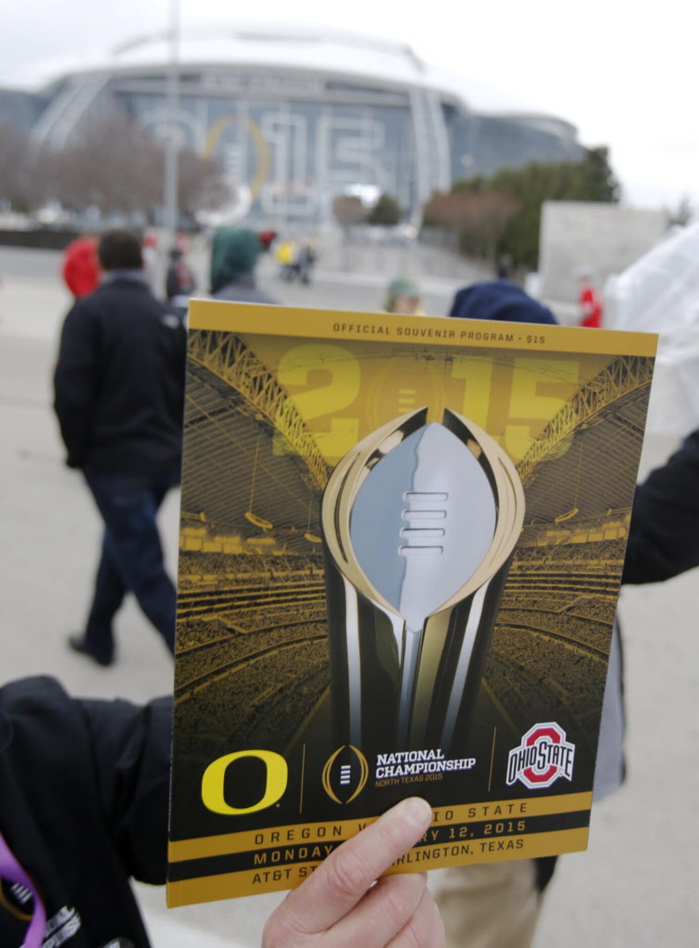 Game program for sale outside of stadium before a game between Oregon and Ohio State...