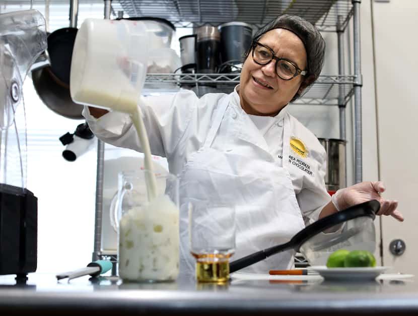 Andrea Pedraza uses a fresh batch of horchata to make a Carlota drink at CocoAndre...