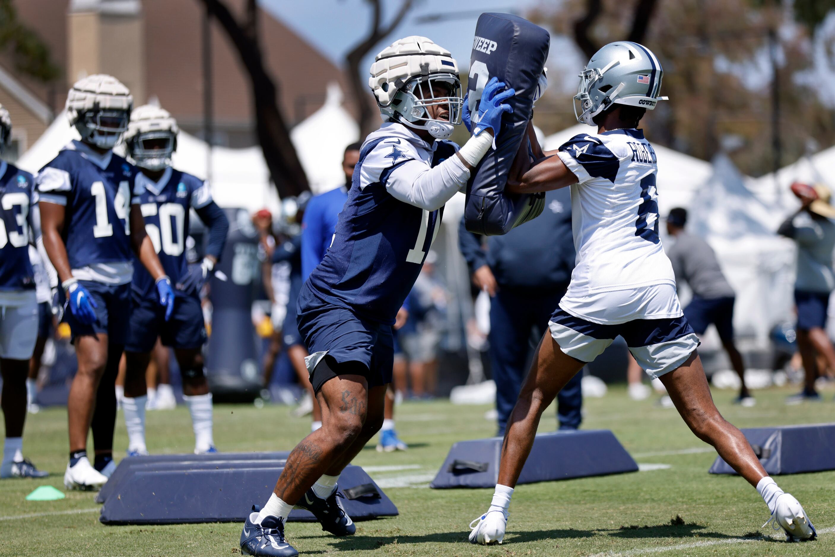 Dallas Cowboys outside linebacker Micah Parsons (11) hits a block by wide receiver Jaquarii...