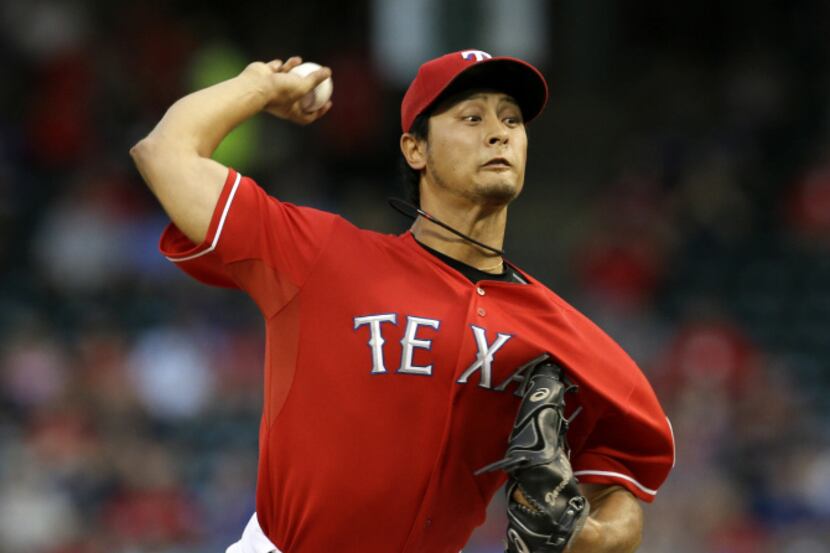Texas Rangers starting pitcher Yu Darvish (11), of Japan, works against the Pittsburgh...