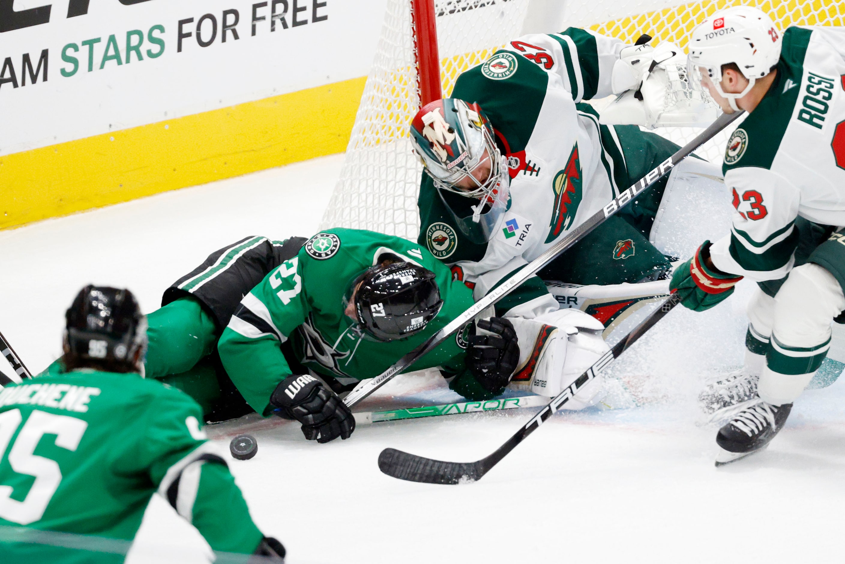 Minnesota Wild goaltender Filip Gustavsson (32) makes a save against Dallas Stars left wing...