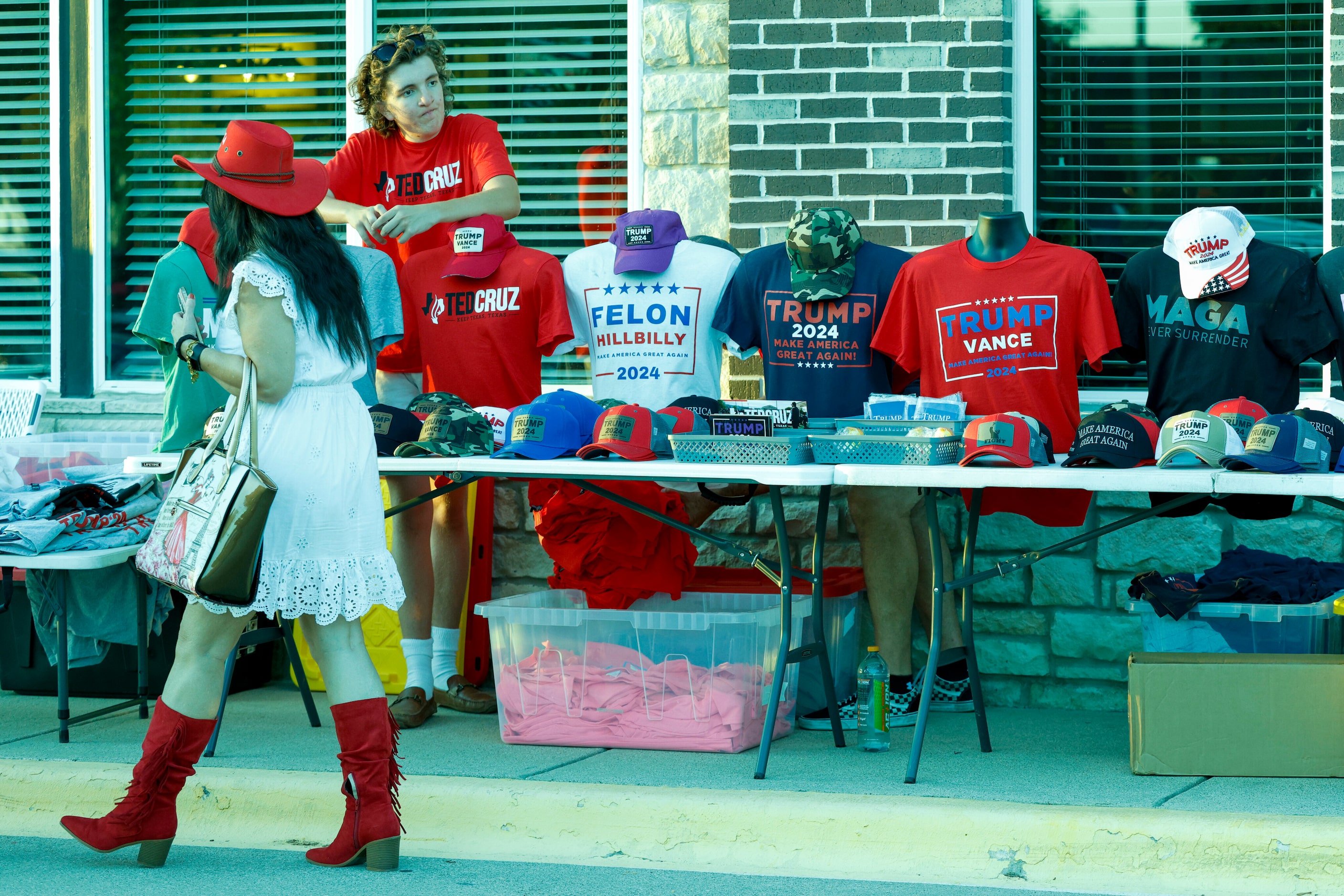 Various merchandise for former President Donald Trump and Senator Ted Cruz (R-Texas) is seen...