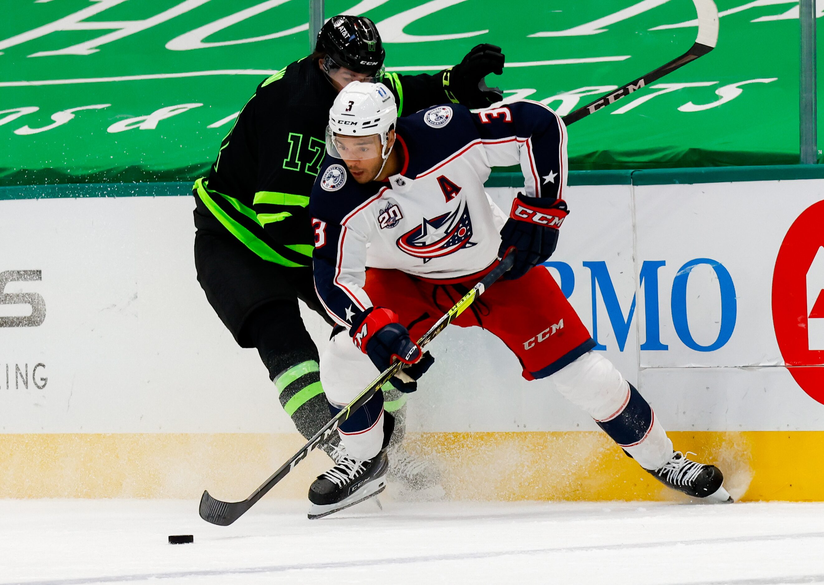 Dallas Stars right wing Nick Caamano (17) attempts to take the puck from Columbus Blue...