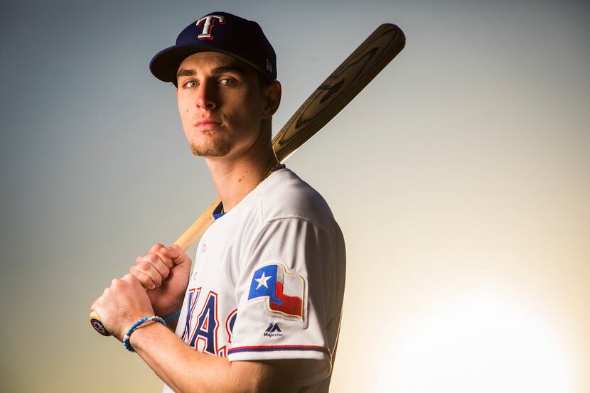 Texas Rangers outfielder Carlos Tocci poses for a photo during Spring Training picture day...