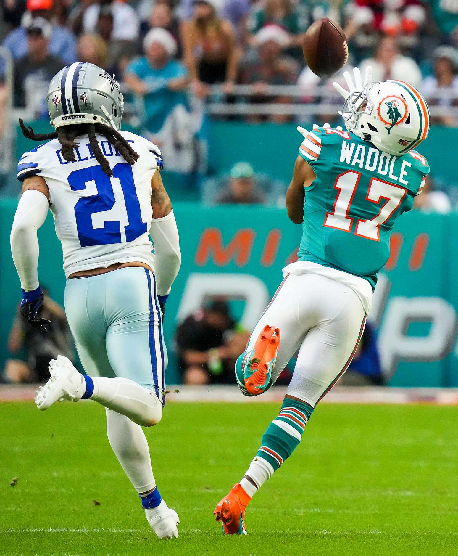 Miami Dolphins wide receiver Jaylen Waddle (17) catches a 50-yard pass as Dallas Cowboys...