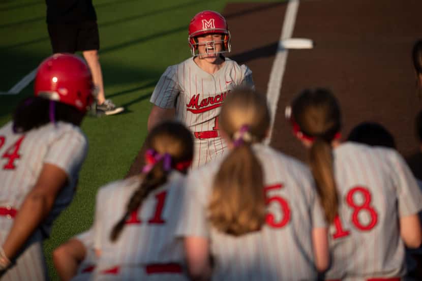 Flower Mound Marcus sophomore Avery Rich (12) runs home after hitting a solo home run during...