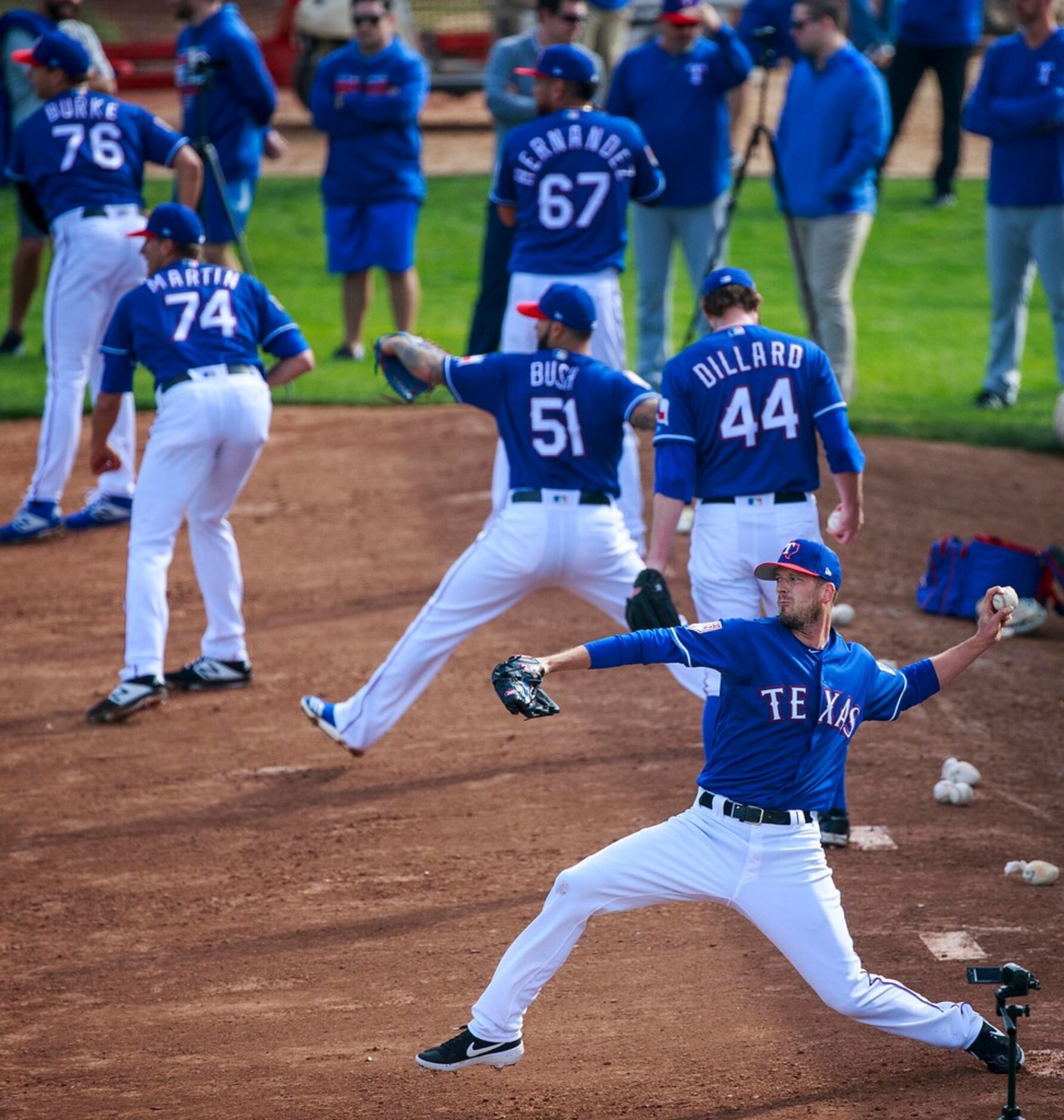 Texas Rangers pitcher Drew Smyly throws in the bullpen during a spring training workout at...