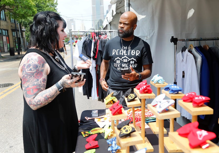 Kristin House (left) of Pottsboro, talks with Edmond Donte James of Rockwall, at James'...