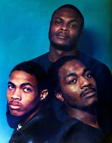 A family portrait shows brothers Marco Clewis (left), Earl Clewis (top) and Matthew Clewis...