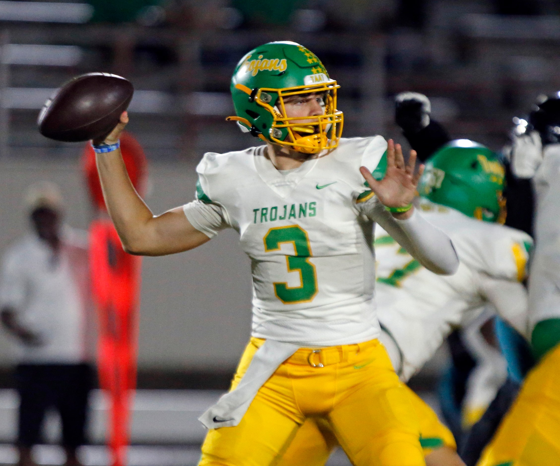 Carrollton Newman Smith High QB Axel Lofstrand (3) throws a pass during the first half of a...