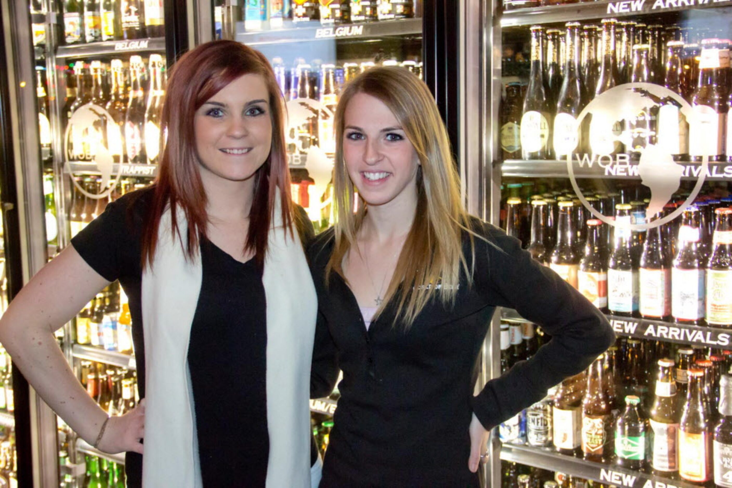 Haley Weaver and Chelsea Rogers serving up the wide selection of beer at World of Beer near...