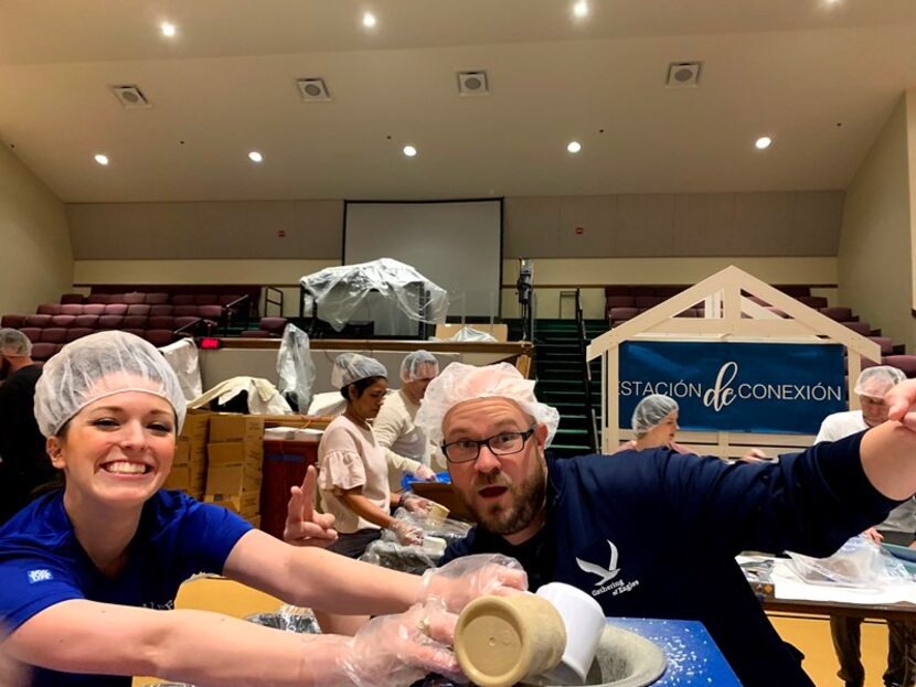 Volunteers with NYL wearing hair aprons