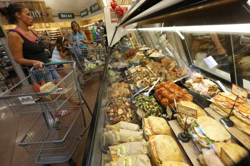 Gretchen Massey looks at deli options at Sprouts Farmers Market in Allen, TX June 29, 2016. ...