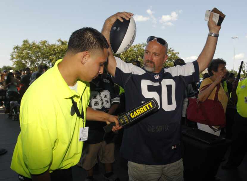 David Talbot was scanned by security guard Jesus Ramirez before the Cowboys’ Silver and Blue...