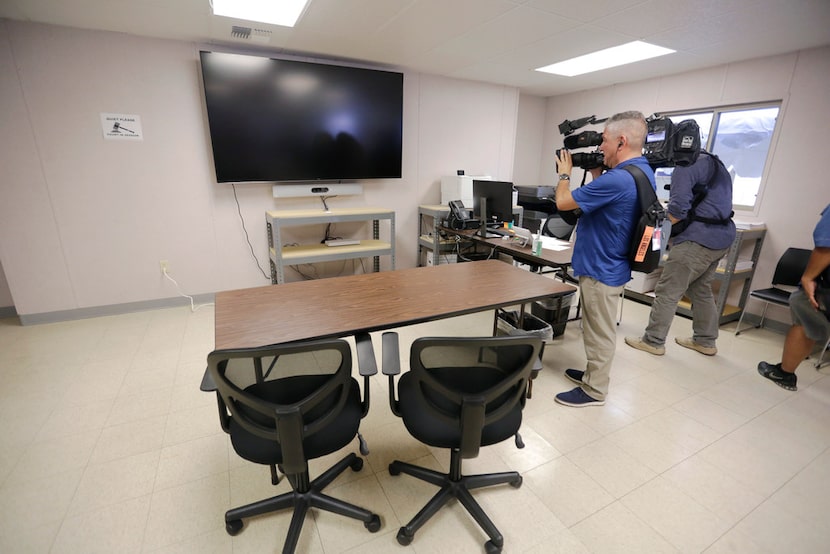 A courtroom in a tent for migrants who are applying for asylum in the United States is seen...