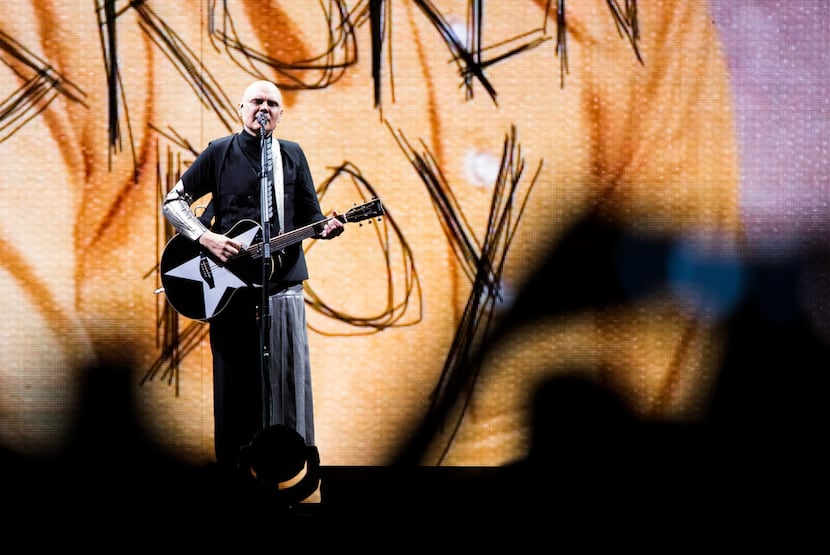 Lead singer and guitar player Billy Corgan performs with the Smashing Pumpkins on July 18,...