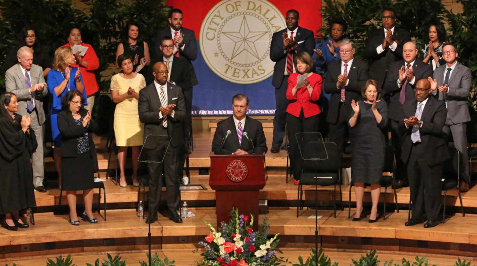 Dallas Mayor Mike Rawlings got a standing ovation during his remarks after the Dallas City...